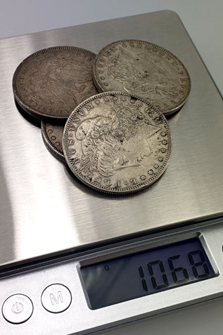 silver-coin-scale